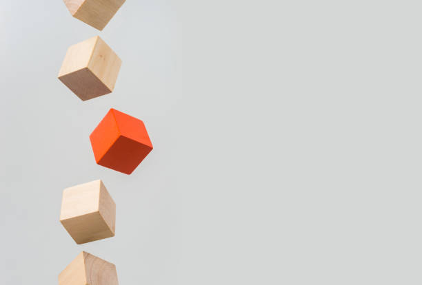 istock Abstract geometric real floating wooden cube on grey background 684134324