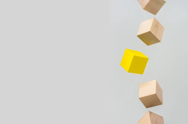 istock Abstract geometric real floating wooden cube on grey background 684134548