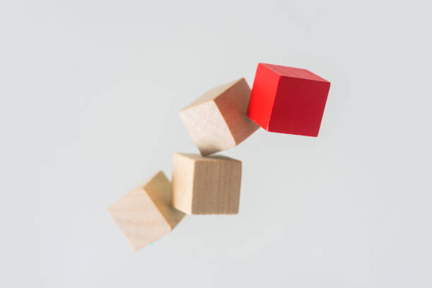 istock Abstract geometric real floating wooden cube on grey background 684137076