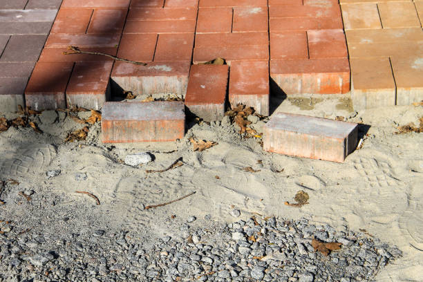 istock Construction of a new pavement of paving slabs. Pavement cobblestone blocks construction of path, road or sidewalk 684140216