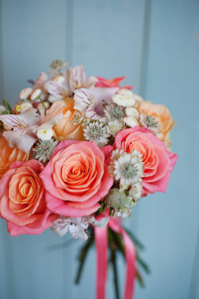 istock beautiful lush bouquet with roses, turquoise background, gift 684141288