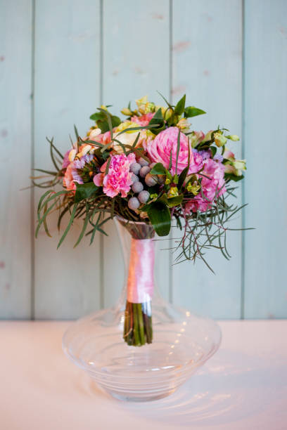 istock beautiful lush bouquet with roses, turquoise background, gift 684141314