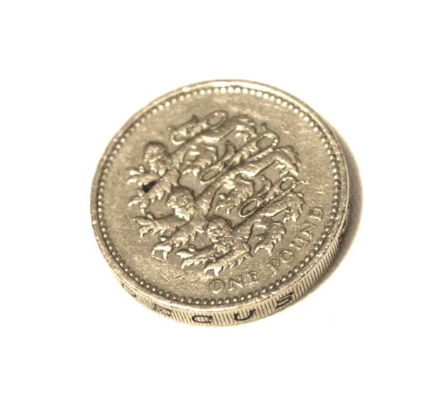 istock british old pound coin close up on white background 684145418