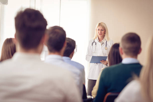 Psychology professor and students in classroom
