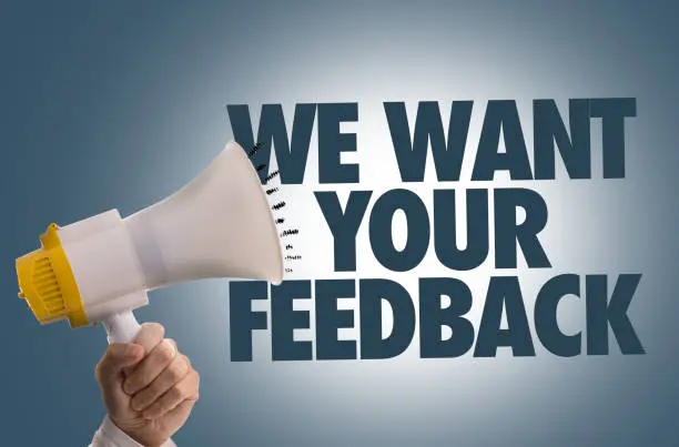 We Want Your Feedback sign