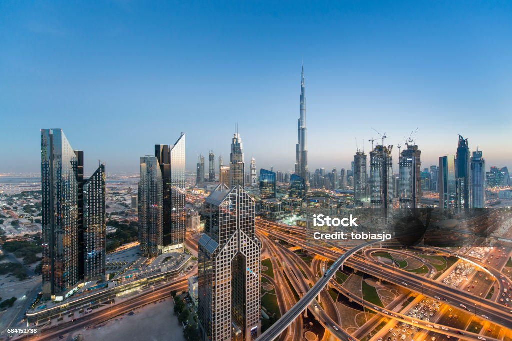 Dubai skyline Dubai skyline seen during the evening. Dubai Stock Photo