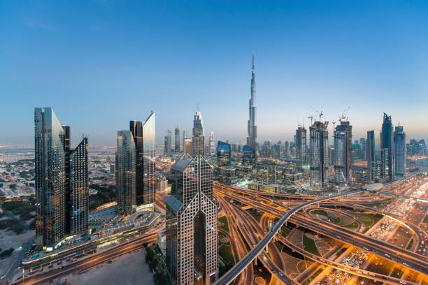 Dubai skyline Dubai skyline seen during the evening. dubai stock pictures, royalty-free photos & images