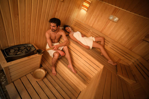 istock Young couple relaxing in sauna 684155522