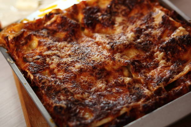 istock Freshly baked lasagna in baking pan. Making Lasagna Bolognese Series. 684160174
