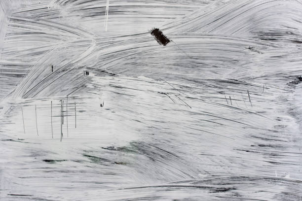 istock White paint, stains on a glass 684162156