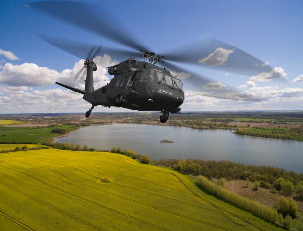 istock Black Hawk Uh-60 military Helicopter in flight - aerial view close up 684173030