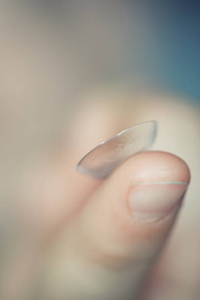 istock Closeup of contact lens on finger 684173214