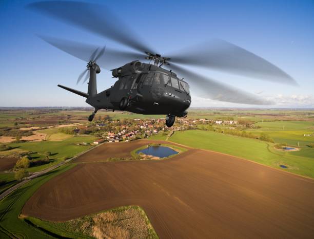 istock Black Hawk Uh-60 military Helicopter in flight - aerial view close up 684173406