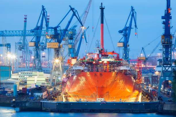 istock Ship Maintenance in Dry Dock at Dusk, Hamburg Harbor, Germany 684186542