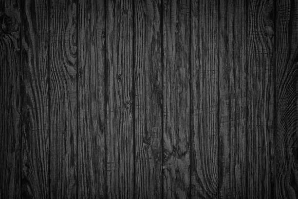 istock dark wood. Rustic wooden table background top view 684195338