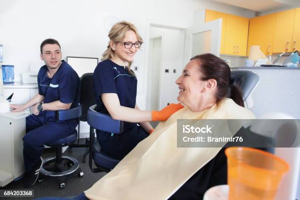 Dentist Check And Repair Tooth Of Senior Woman Stock Photo - Download Image Now - 50-54 Years, 60-64 Years, Adult