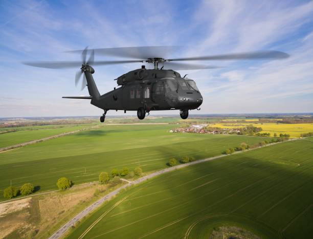 istock Black Hawk Uh-60 military Helicopter in flight - aerial view close up 684243912