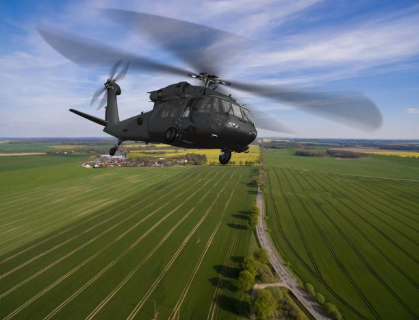 istock military Helicopter in flight - aerial view close up 684244598