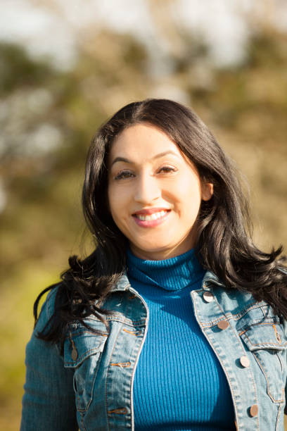 istock One Latin descent woman outdoors in park. 684244844