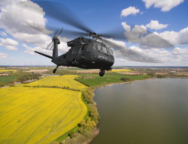 istock Helicopter in flight - aerial view close up 684248396