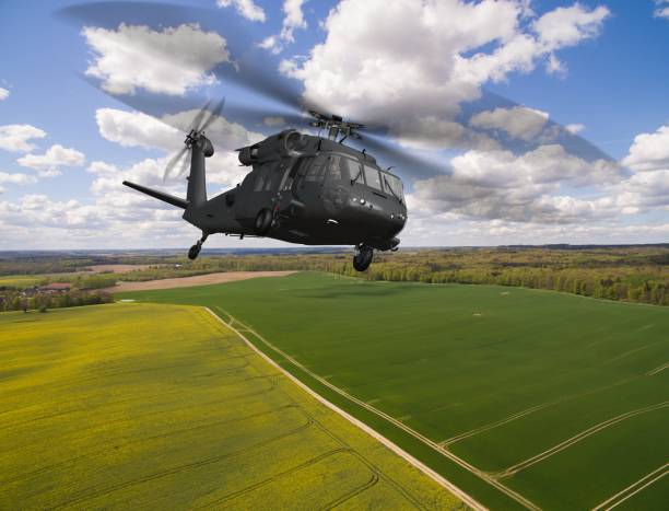 istock Black Hawk Uh-60 military Helicopter in flight - aerial view close up 684249070