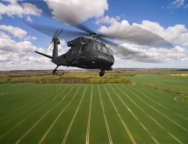 istock Black Hawk Uh-60 military Helicopter in flight - aerial view close up 684251914