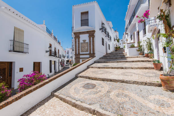 charming narrow historic streets of white village frigiliana. - nerja imagens e fotografias de stock