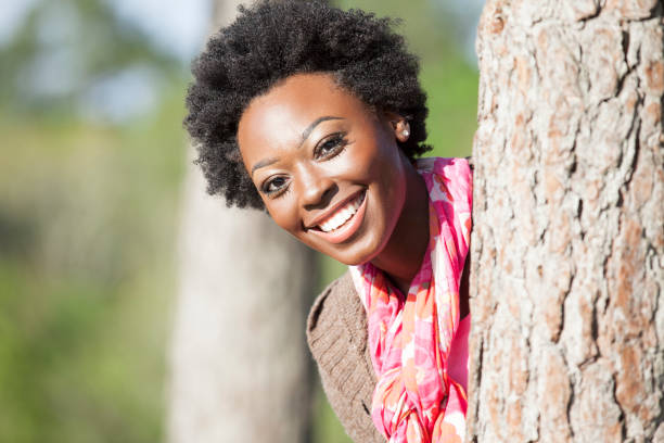 istock One African descent woman outdoors in park. 684255900