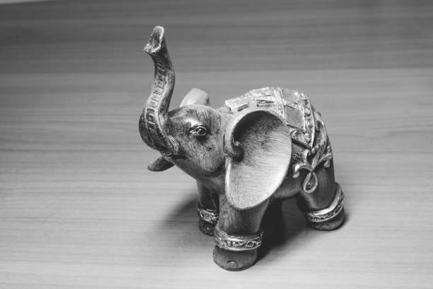 istock beautiful decorative elephant stands on the table background BW, 684265440