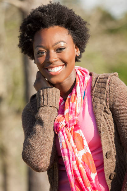 istock One African descent woman outdoors in park. 684273948