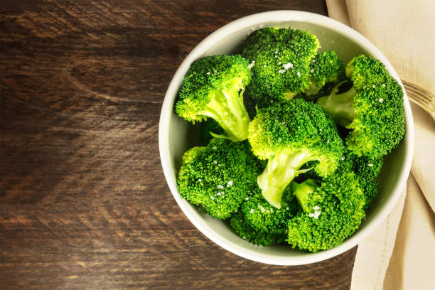 istock Cooked green broccoli with sea salt and copyspace 684289750