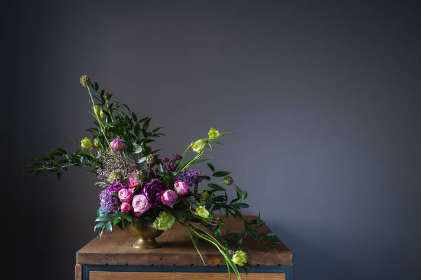 Classical flower arrangement on a wooden table