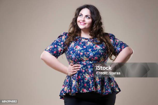 Plus Size Fashion Model In Casual Clothes Fat Woman On Beige Studio Background Overweight Female Body Stock Photo - Download Image Now