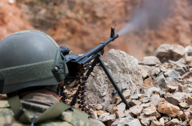 istock Turkish Army soldier firing with machine gun 684432526