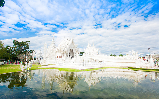 Famous Thailand temple or grand white church Call Wat Rong Khun, at Chiang Rai province, northern Thailand