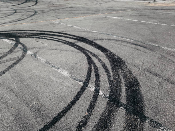 istock Abstract road background with tracks of tires. 684447542