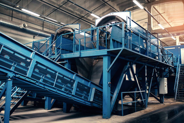 istock Waste processing plant. Technological process. Recycling and storage of waste for further disposal. Business for sorting and processing of waste. 684451544