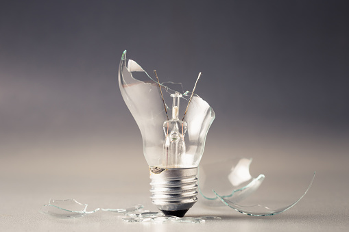 Broken light bulb for problem situation concept