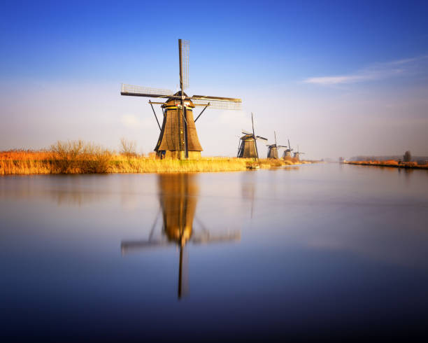 istock Sunset view at typical windmill at Kinderdijk, Holland. 684467224