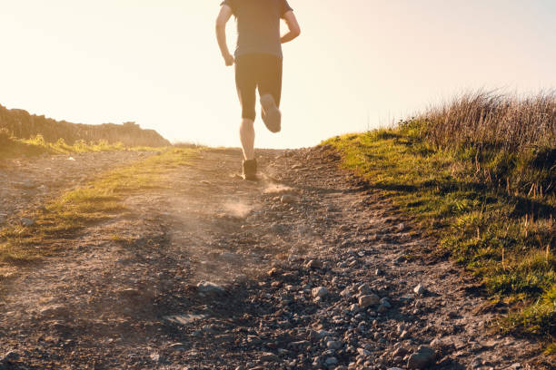 istock Man fell running in remote hillside location. 684471060