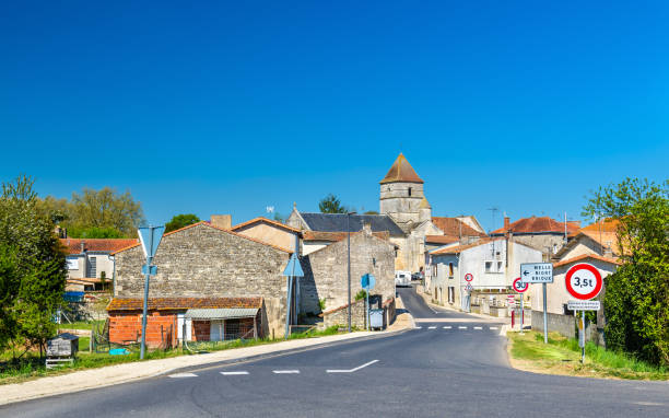 The medieval village of Chef-Boutonne in France The medieval village of Chef-Boutonne in the Deux-Sevres department of France france village blue sky stock pictures, royalty-free photos & images