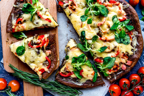 istock ingredients and vegetarian pizza on blue stone table background top view 684474356