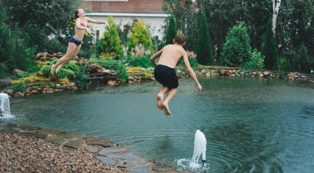 istock kids in swimming pool 684475188