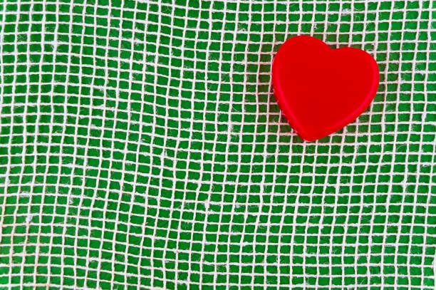 istock Heart on a green background. 684495288