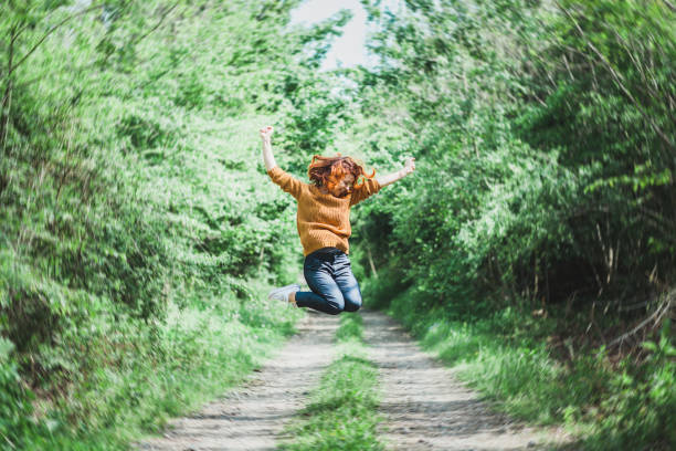 istock Young woman in mid air 684529996