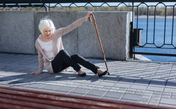istock Grey headed woman feeling helplessness in the street 684536046