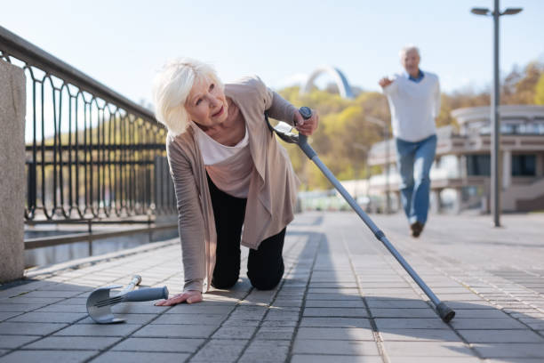 istock Powerless woman falling in the street 684536344