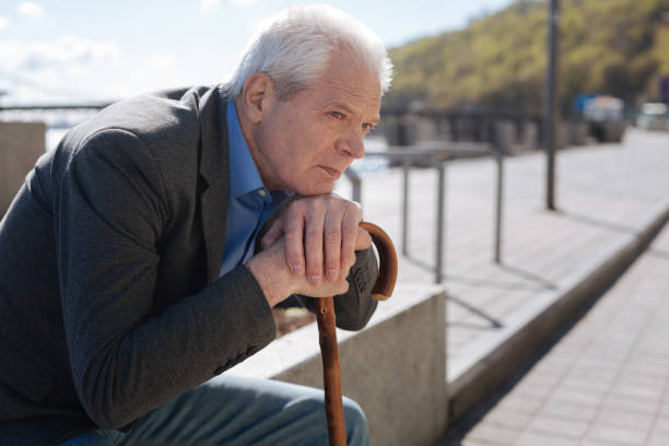 istock Serious pensioner relaxing outdoors 684540102