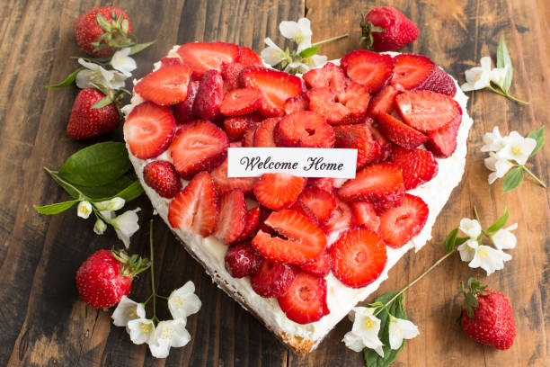 istock Welcome Home Card with Heart Cheesecake with Strawberries 684540134