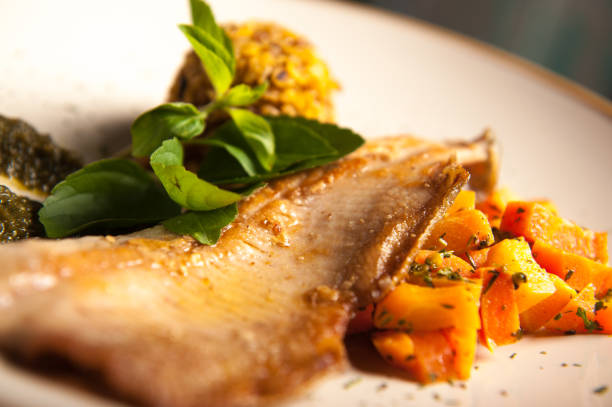 istock Trout in pesto sauce with white rice 684545674
